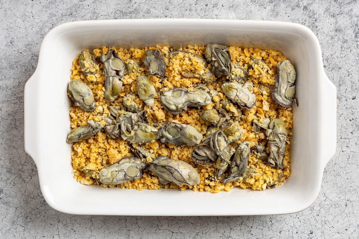 Taste of Home Scalloped Oysters photo of layering the dish.