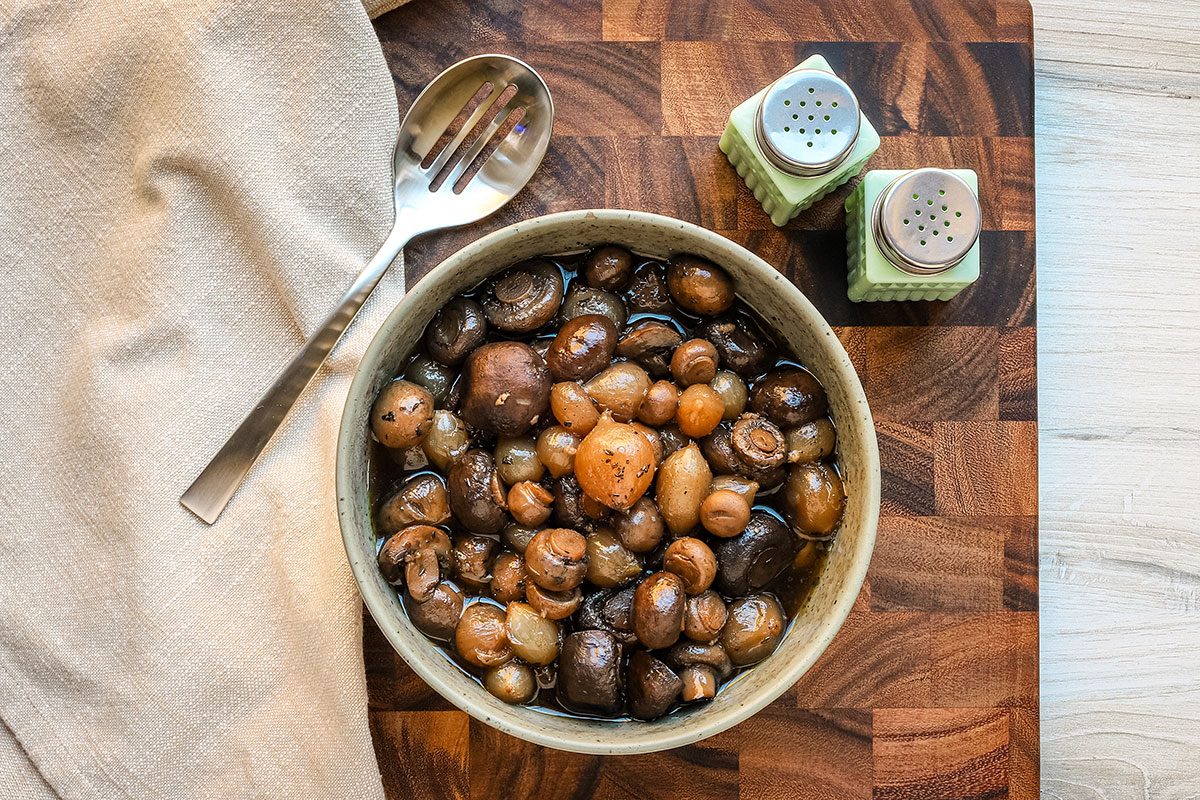 Slow cooker mushrooms in a serving bowl, from Taste of Home.