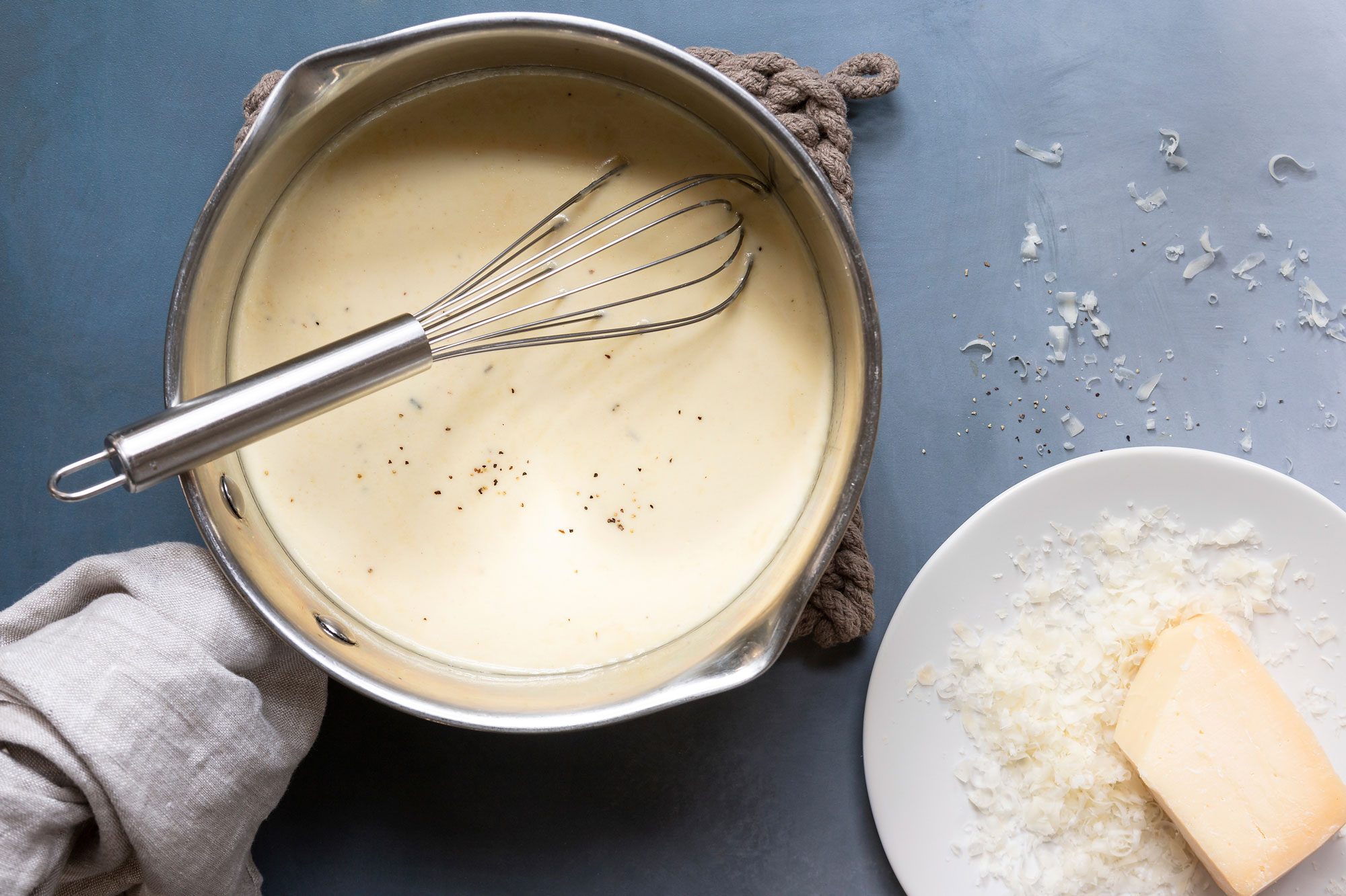 Melt 4 tablespoons of cubed butter in a large, heavy-bottomed saucepan set over medium heat