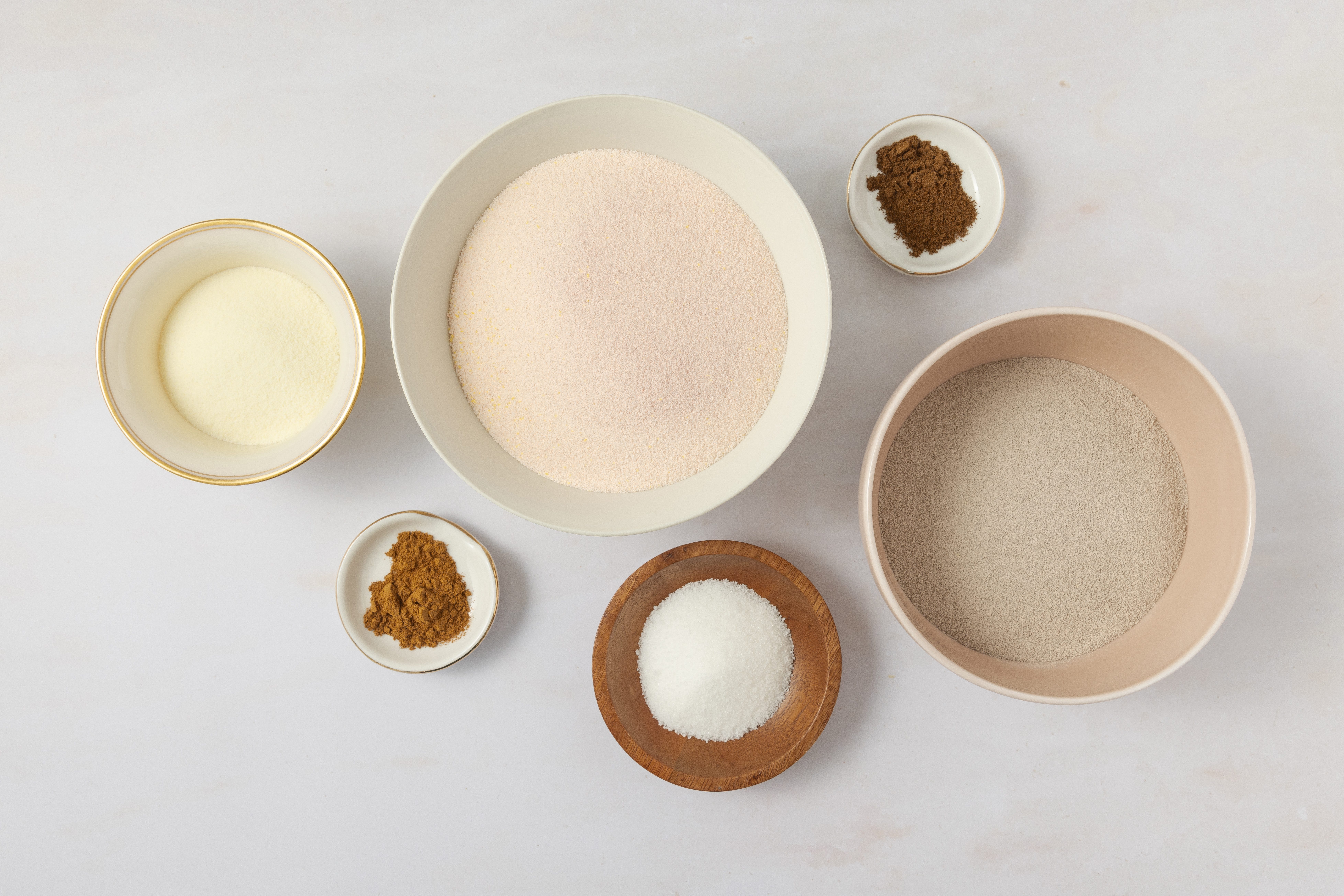 Ingredients for spiced tea on kitchen counter.