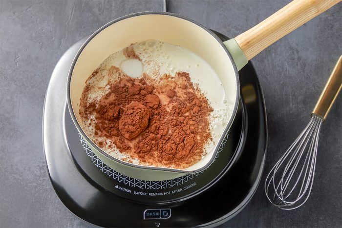 Place milk, cocoa and sugar in a large saucepan over medium heat.