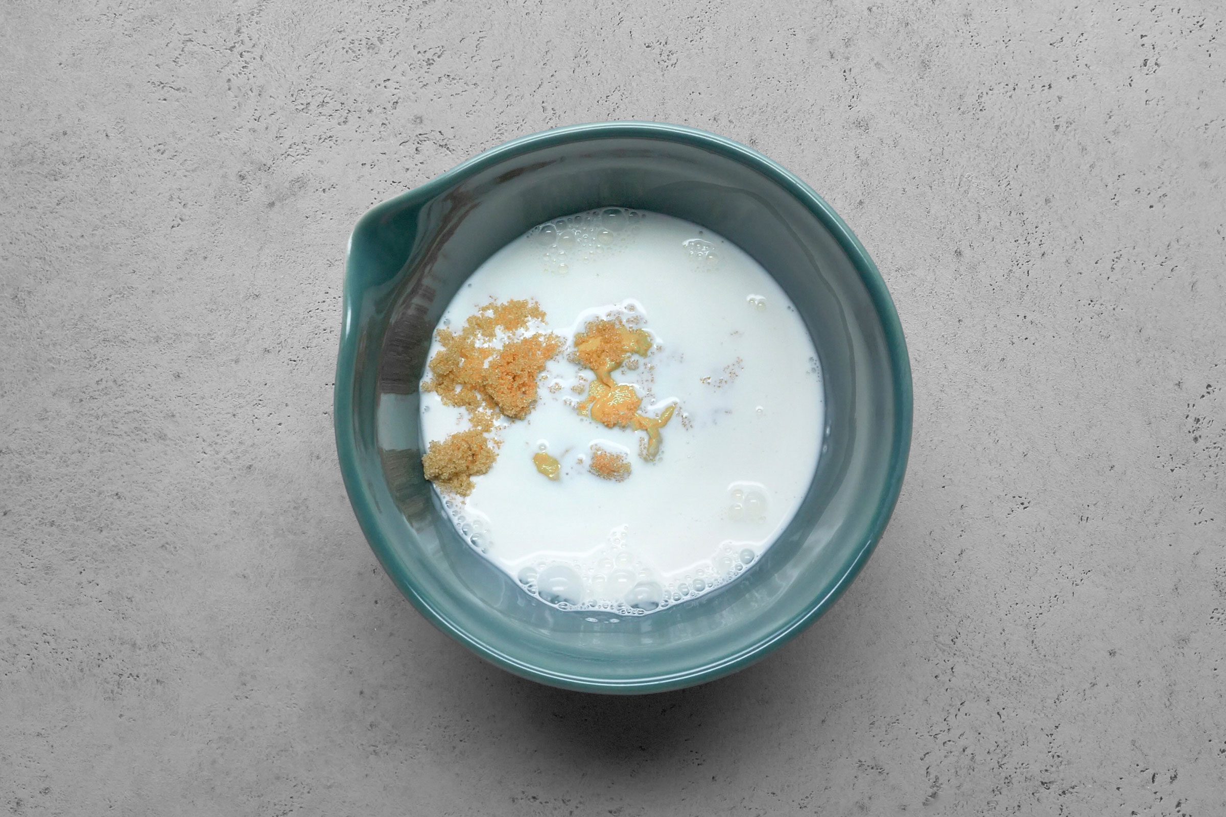 Mustard, brown sugar and cream in a bowl