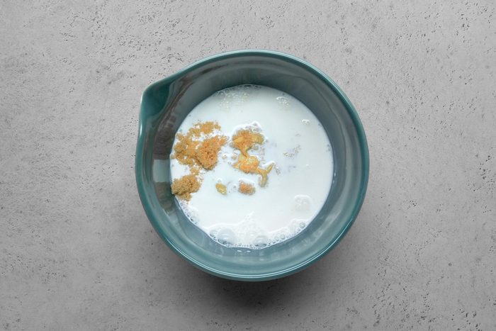 Mustard, brown sugar and cream in a bowl