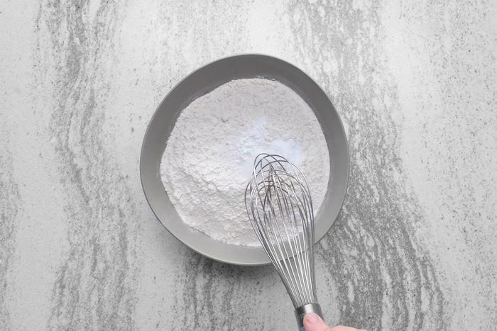 Dry ingredients for lofthouse cookies whisked together in a large bowl