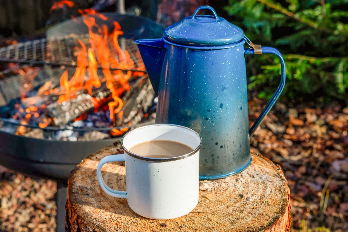 Cowboy coffee made outdoors over wood fire
