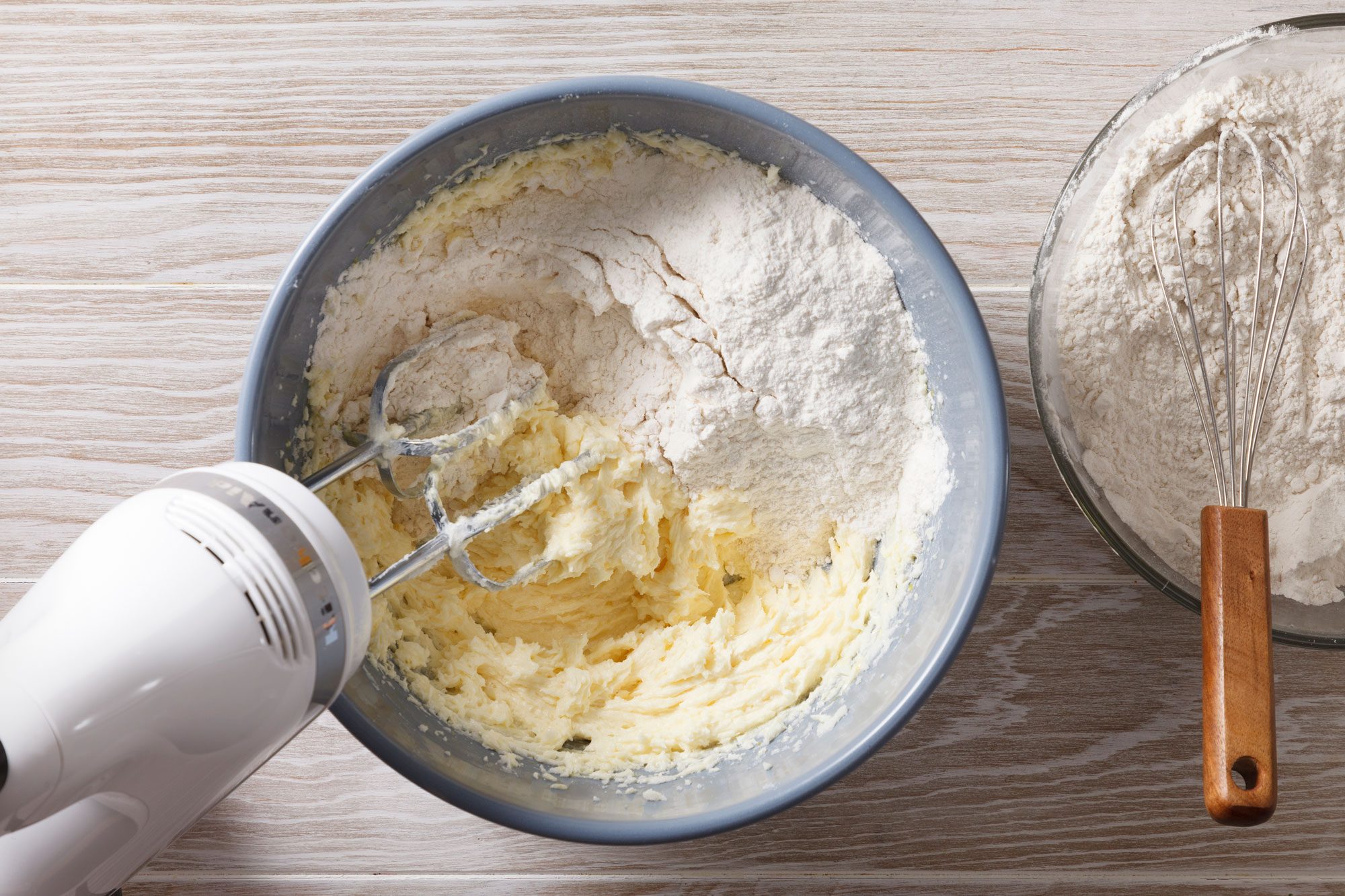 In another bowl, whisk flour, baking powder and salt; gradually beat into creamed mixture.