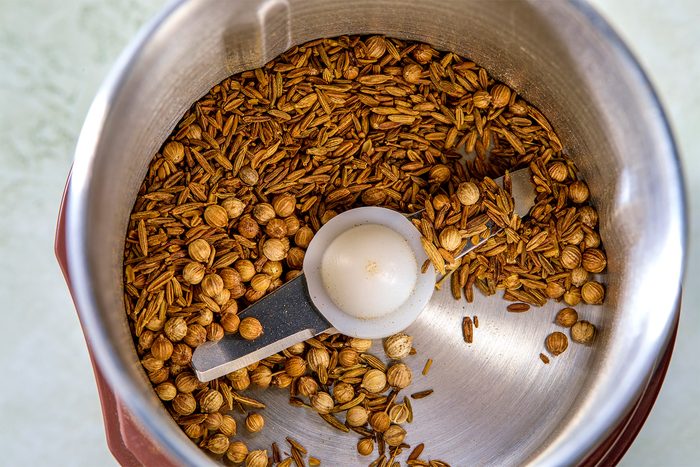 overhead shot In a spice grinder grinding seeds to a powder