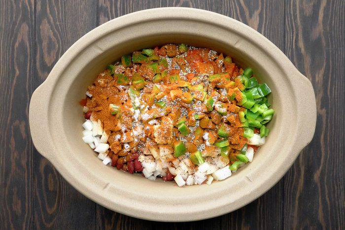 beans, diced tomatoes, tomato sauce, onions, green pepper, garlic, chili powder, salt and pepper added to beef