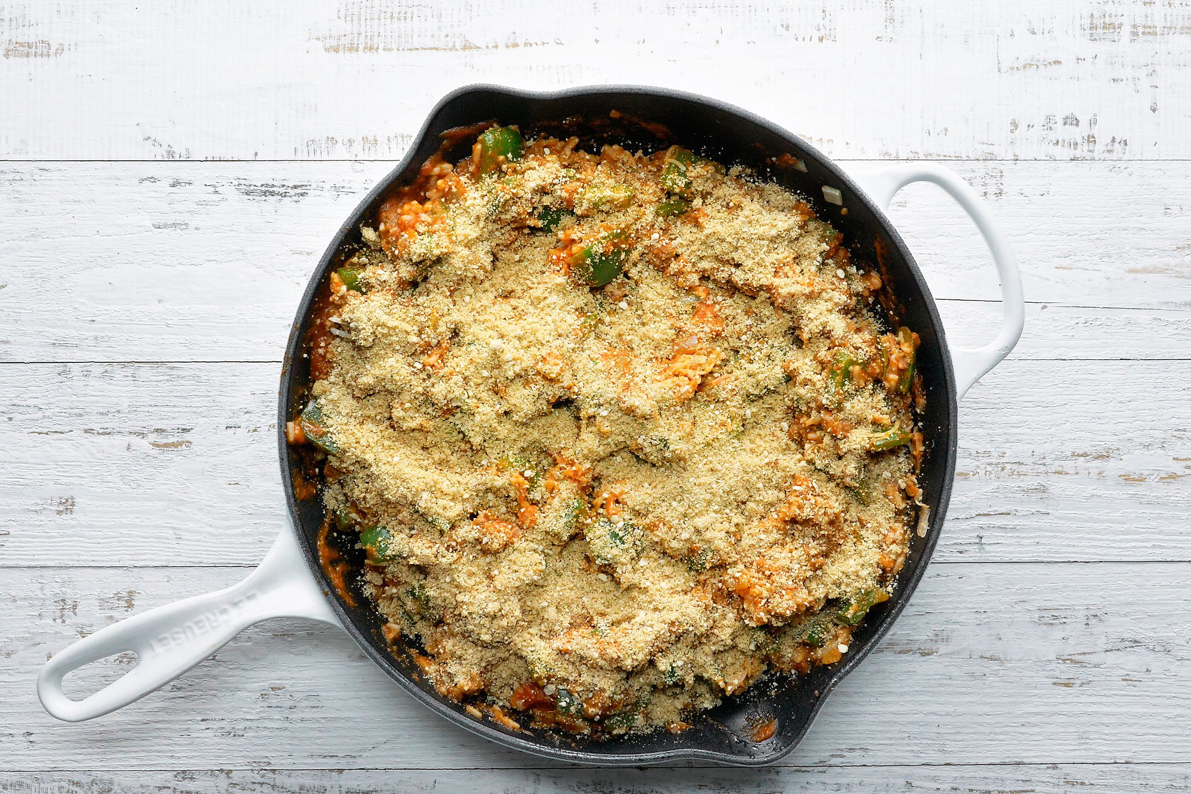 Oil and bread crumbs mixture sprinkled over the unstuffed pepper dish