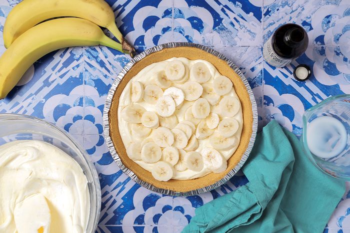 Layered banana slices on top of pudding mixture