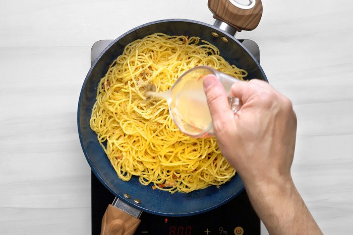 Slowly add egg mixture, stirring constantly