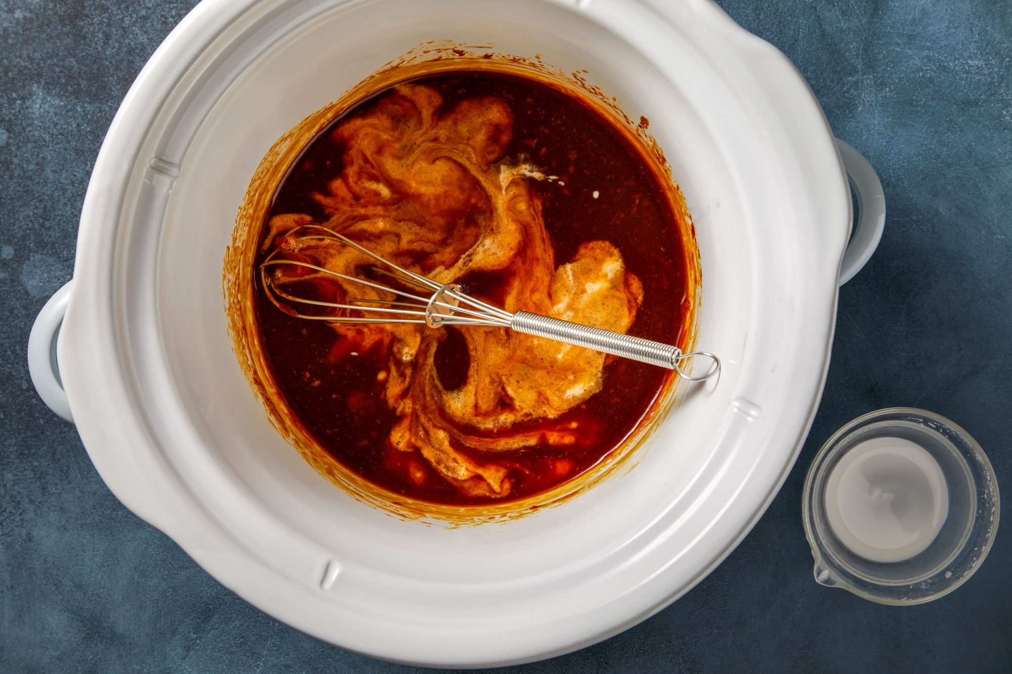 Toss chicken with 3/4 cup sauce