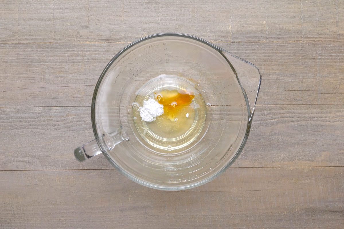 in a small bowl, beat egg whites, cream of tartar and vanilla