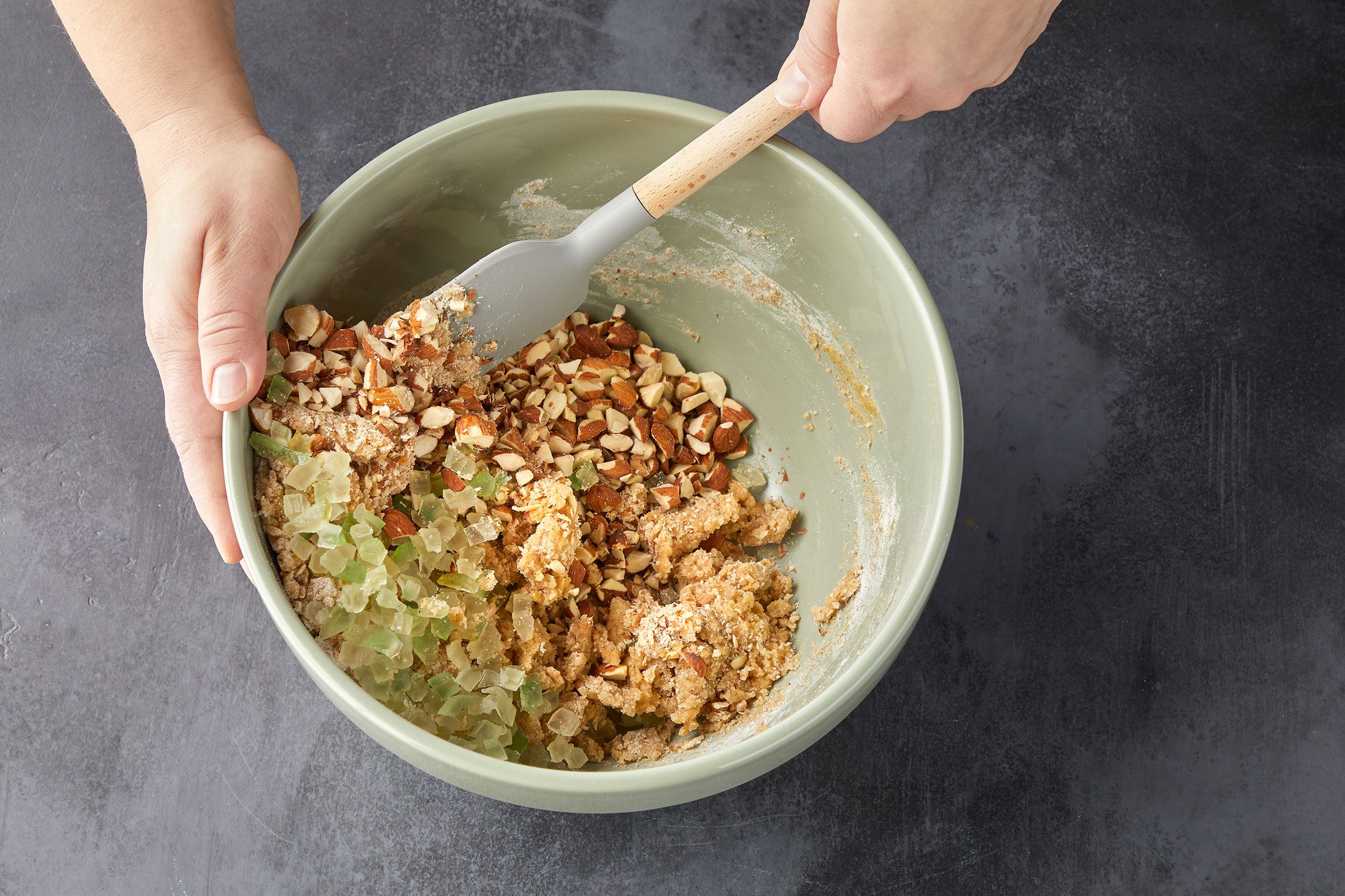 Candied citron and chopped almonds folded into cookie dough mixture