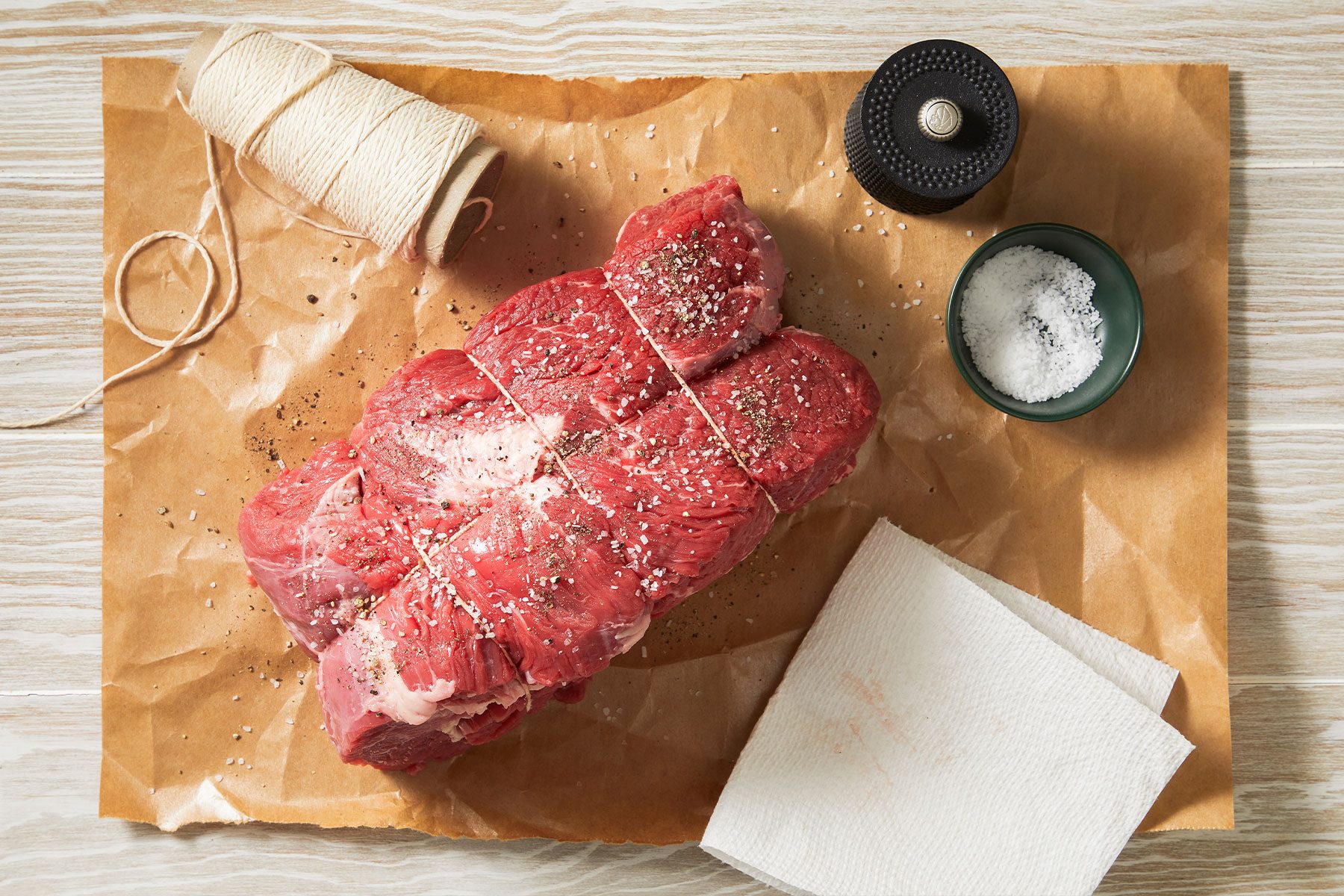 Dry roast tied with kitchen strip at 2 inch intervals with salt and pepper at the side