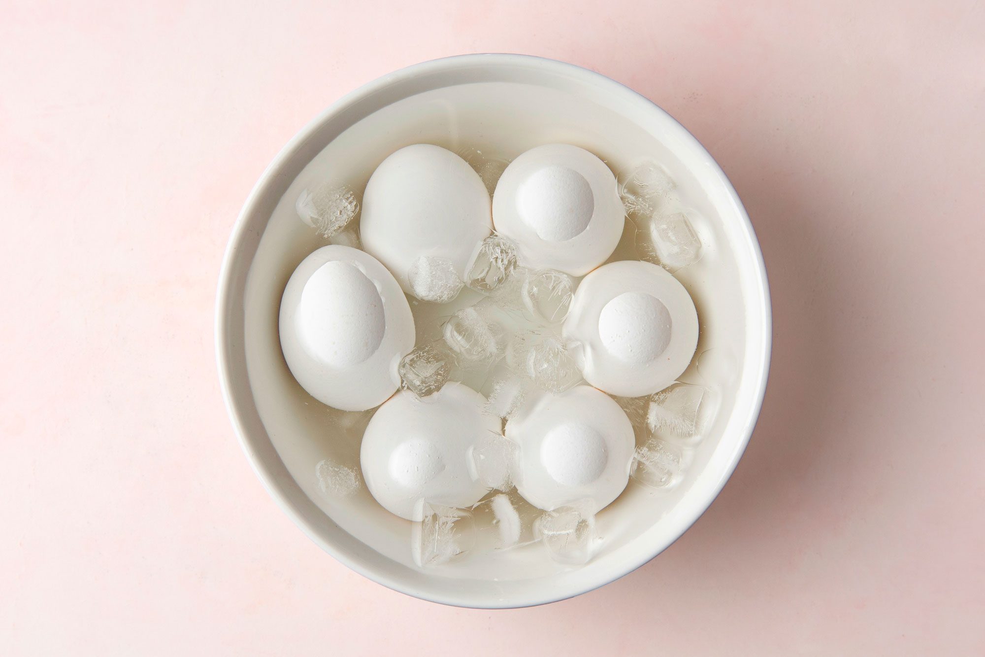 Rinse eggs in cold water and place in ice water until completely cooled.