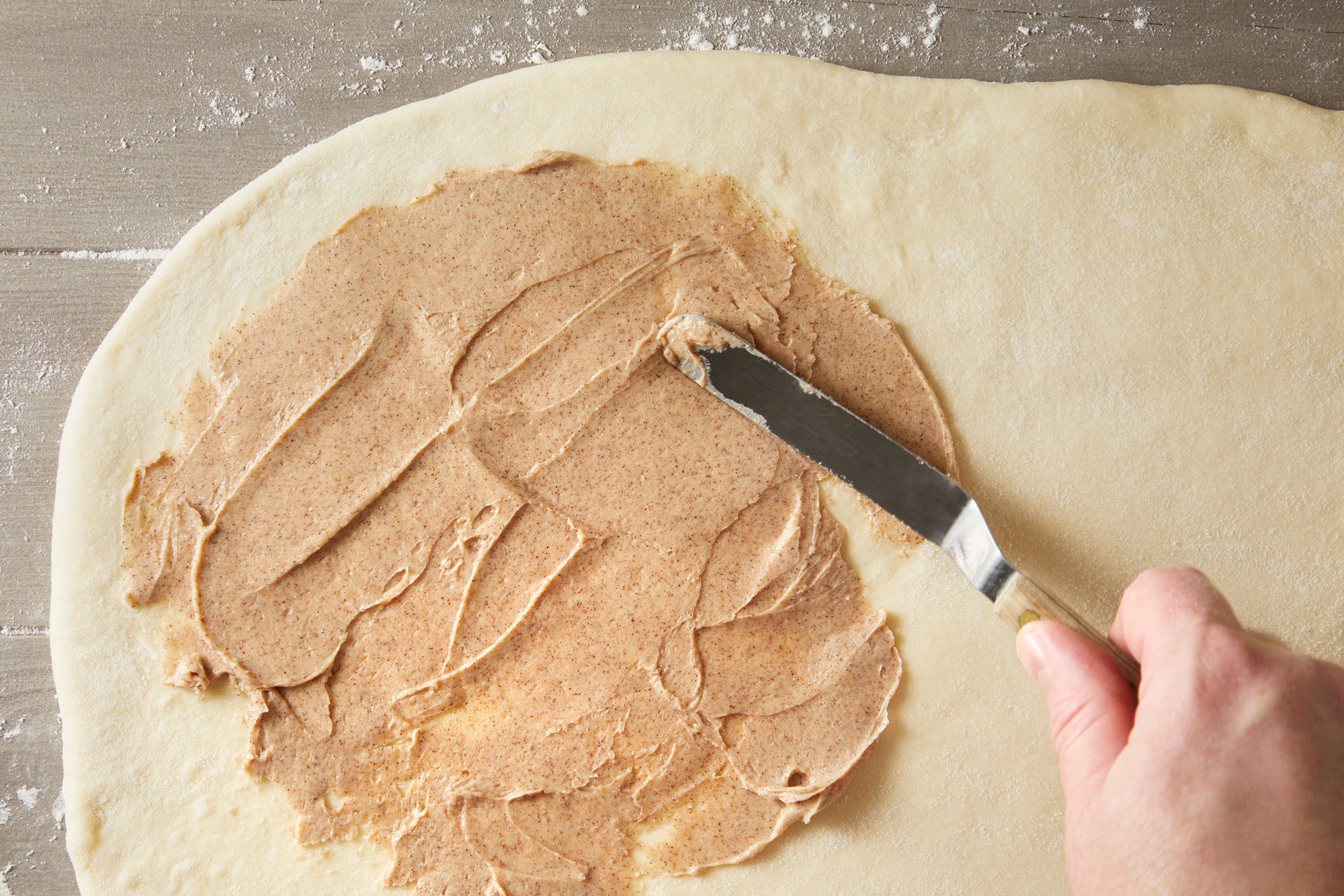 Punch down dough, turn onto a floured surface