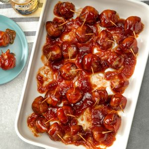 Bacon Wrapped Water Chestnuts in a white dish