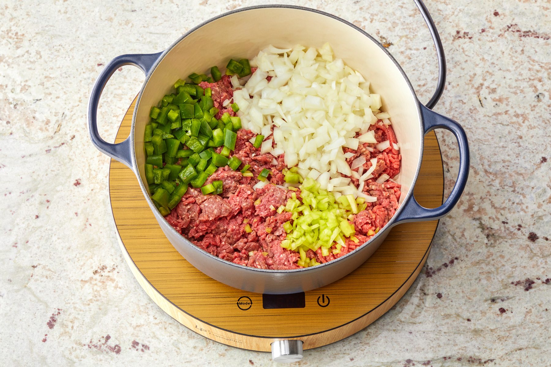 cook beef, onion, peppers in dutch oven