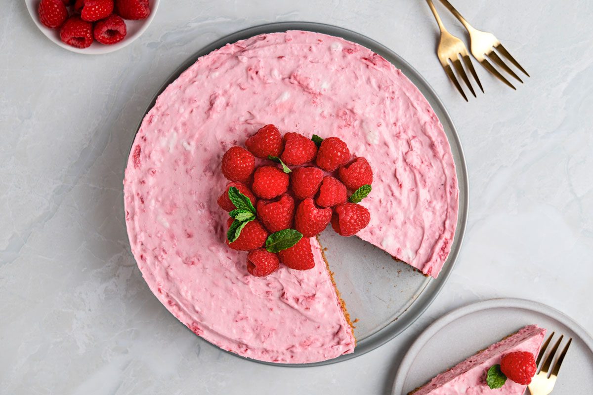 Raspberry Cream Cheese Dessert is ready and served on a Plate
