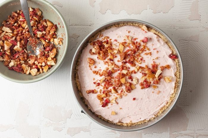 Overhead shot of cheesecake filling in springform pan