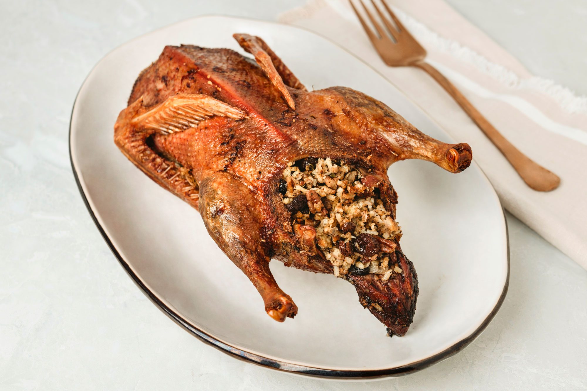 Stuffed Duck is ready and served in a Plate