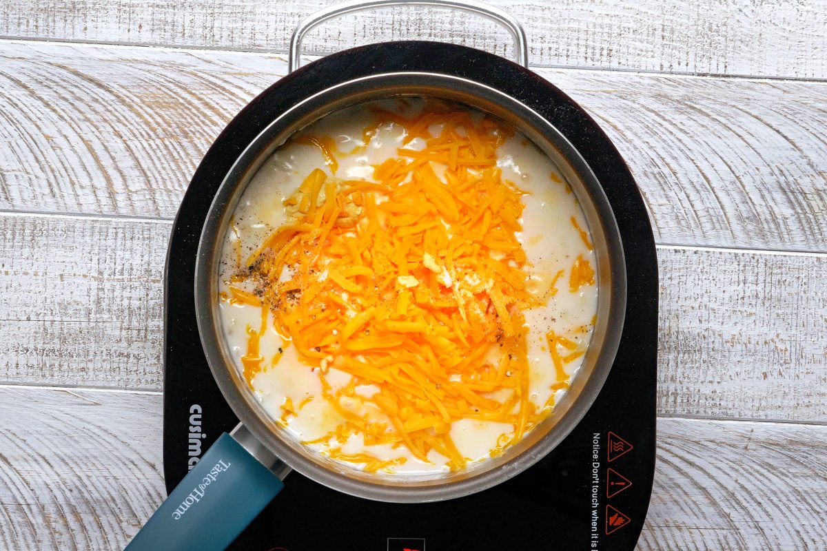 cheese and mustard added to mixture for cheese sauce