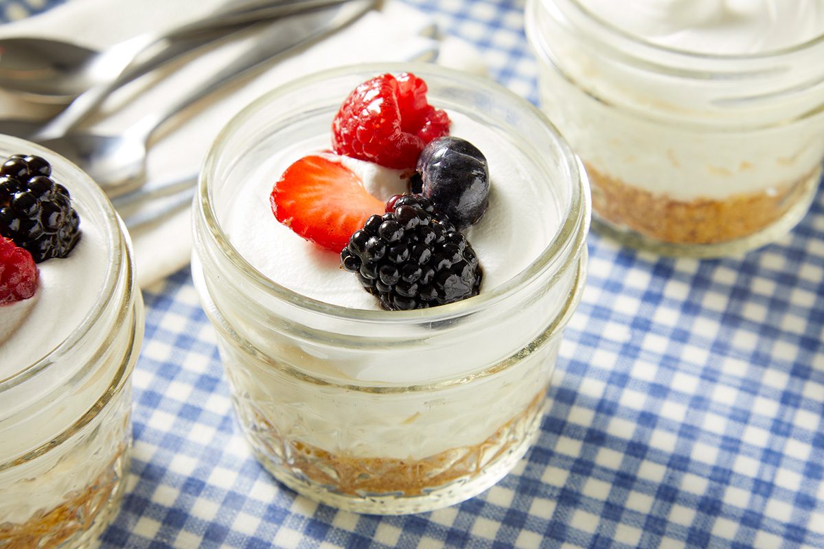Close up shot of Cheesecake Cups topped with fresh berries