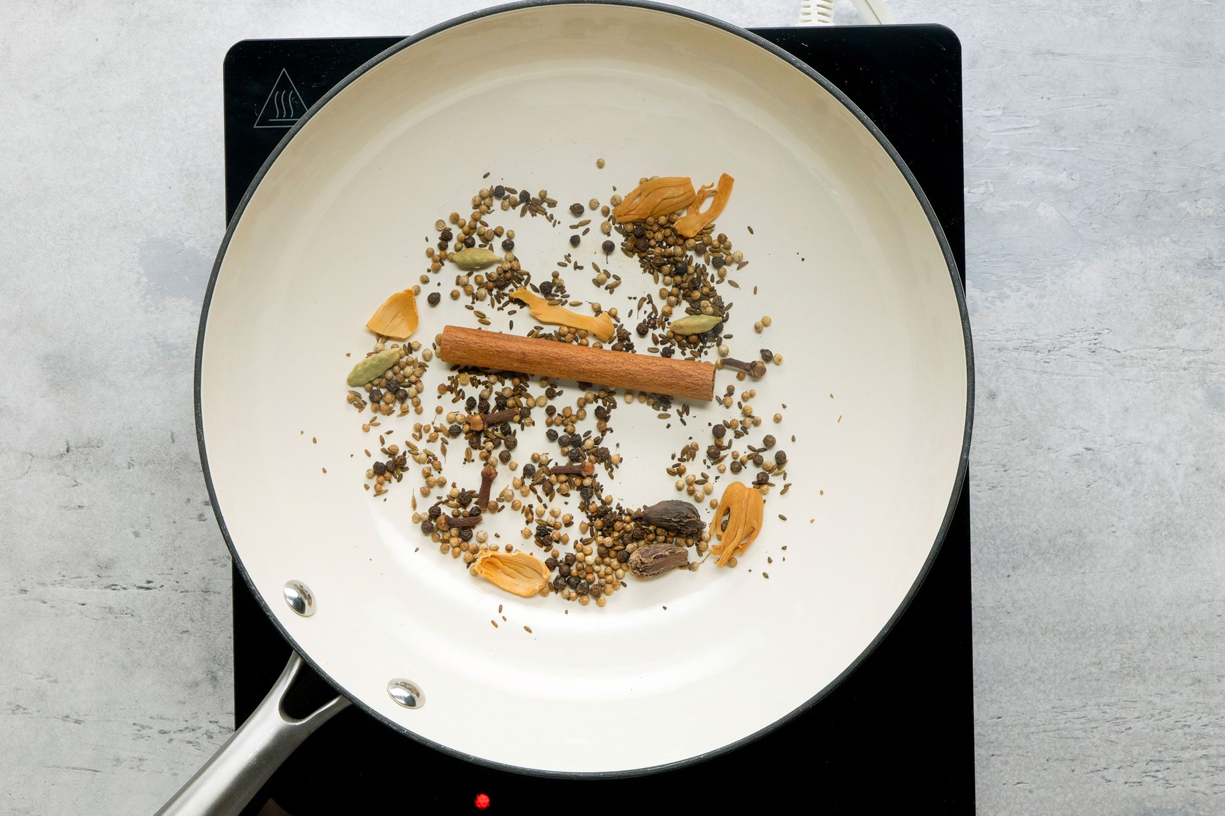 Toasting dry spices in a skillet