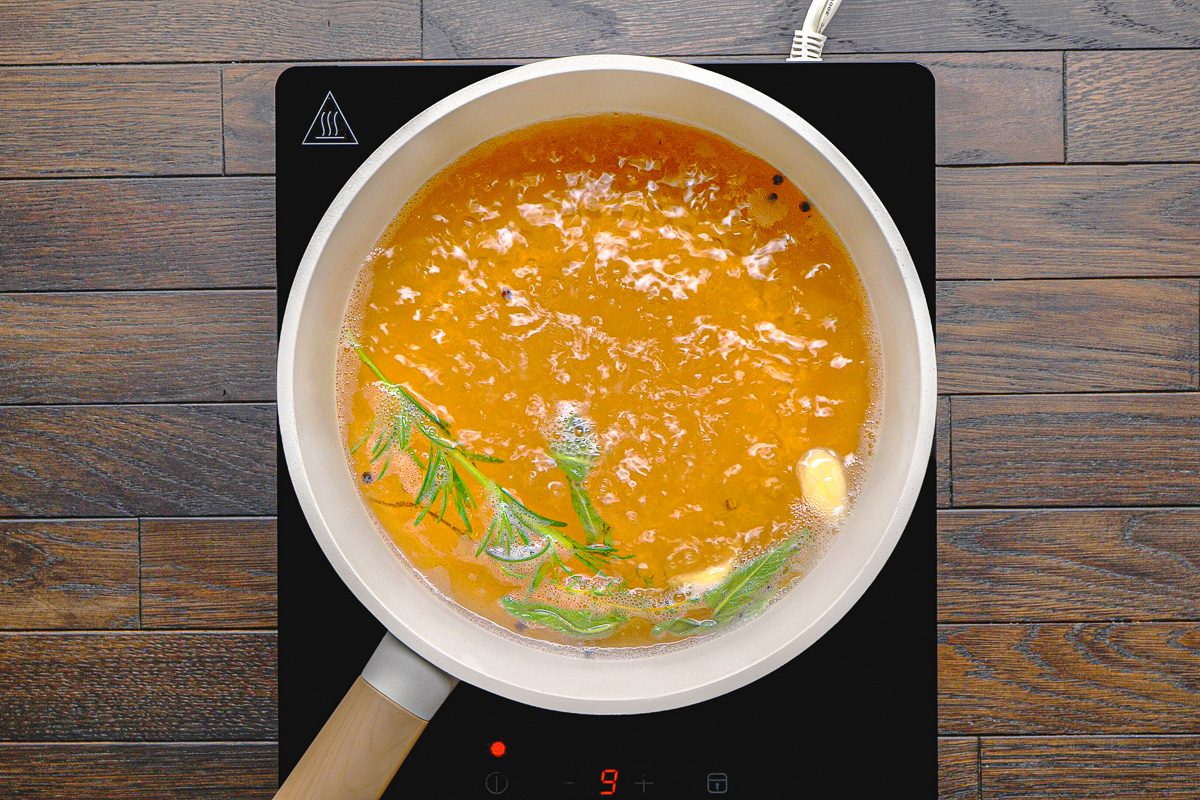 salt, brown sugar, peppercorns, sage, garlic, thyme, rosemary and 1 quart of water in a saucepan