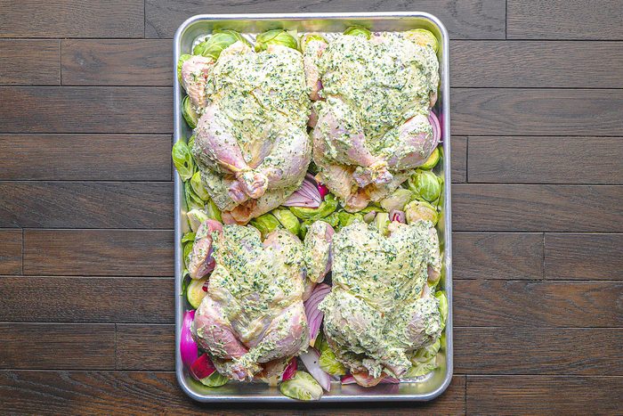 hens placed breast side up, on top of the vegetables