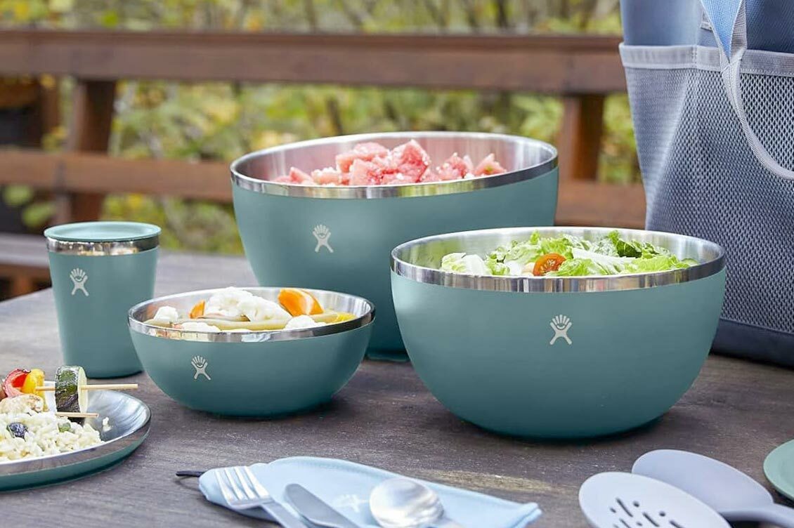 Food kept in insulated bowls placed over table