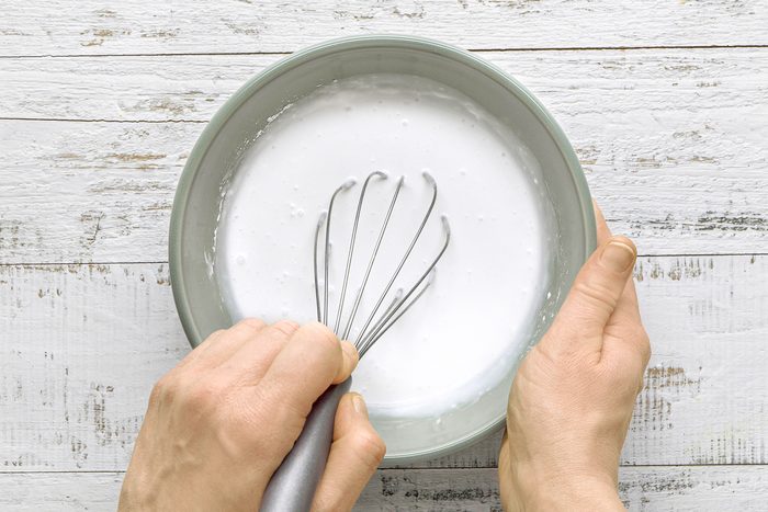 coconut milk and cornstarch whisked together in a small bowl