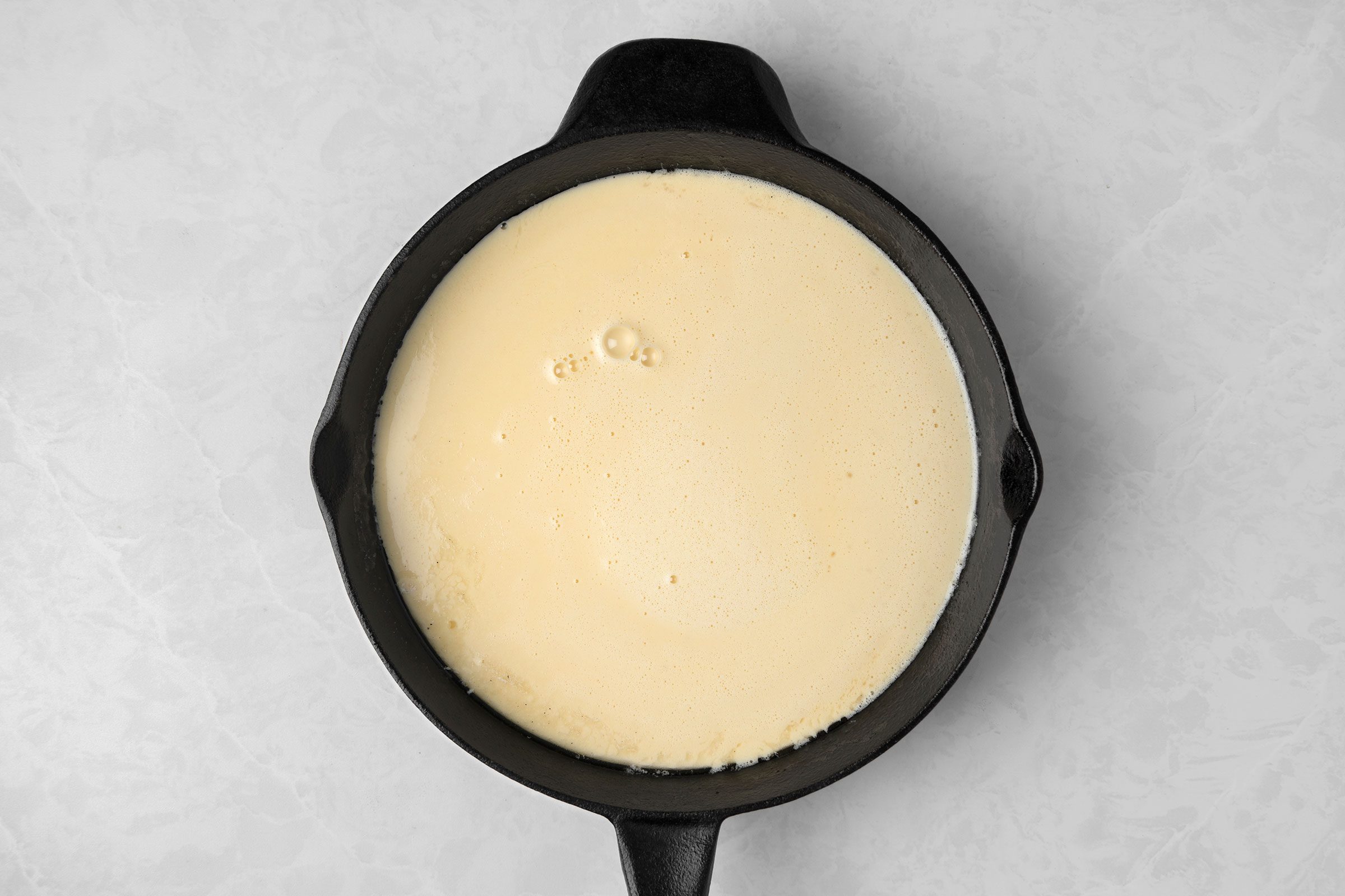 In a bowl, added salt, flour and milk and beaten the mixture well until everything is incorporated.