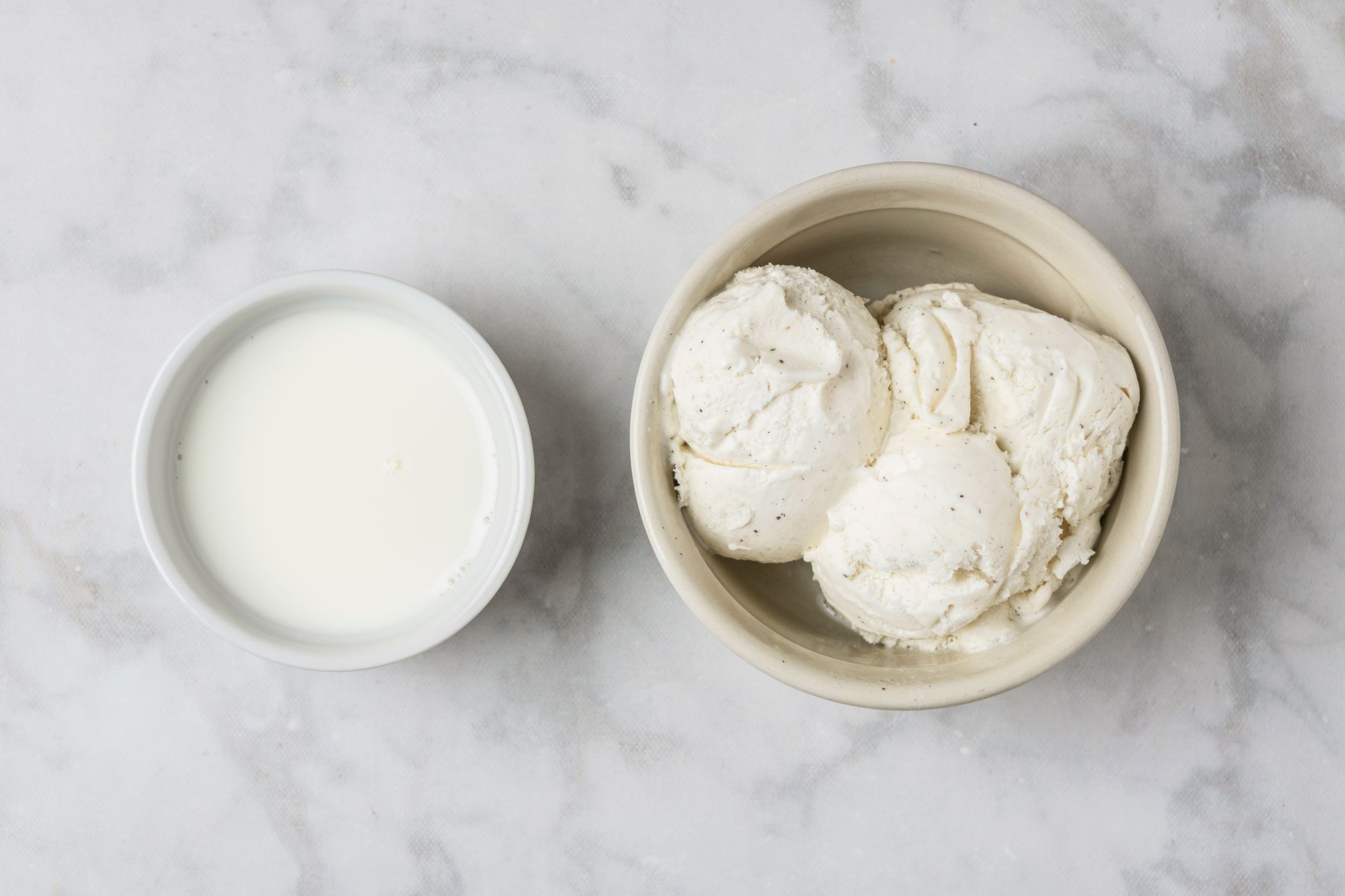 Overhead shot of Milk and Ice cream in a cup