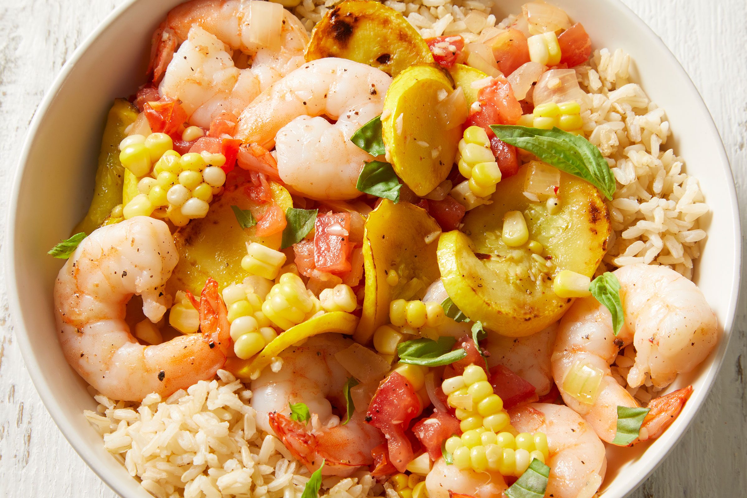 Shrimp And Corn Stir Fry in a white bowl