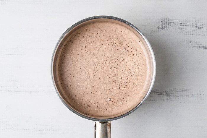 Overhead shot of a large saucepan; combine milk and half-and-half