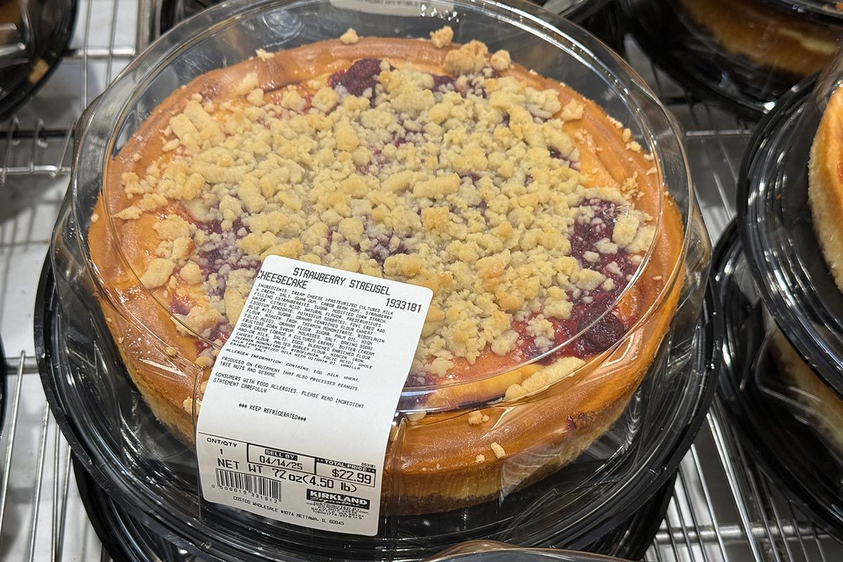 Costco Strawberry Streusel cheesecake package up close on a rack