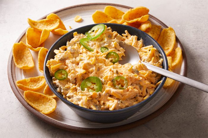 Kenai Dip in a bowl with chips on the pllate