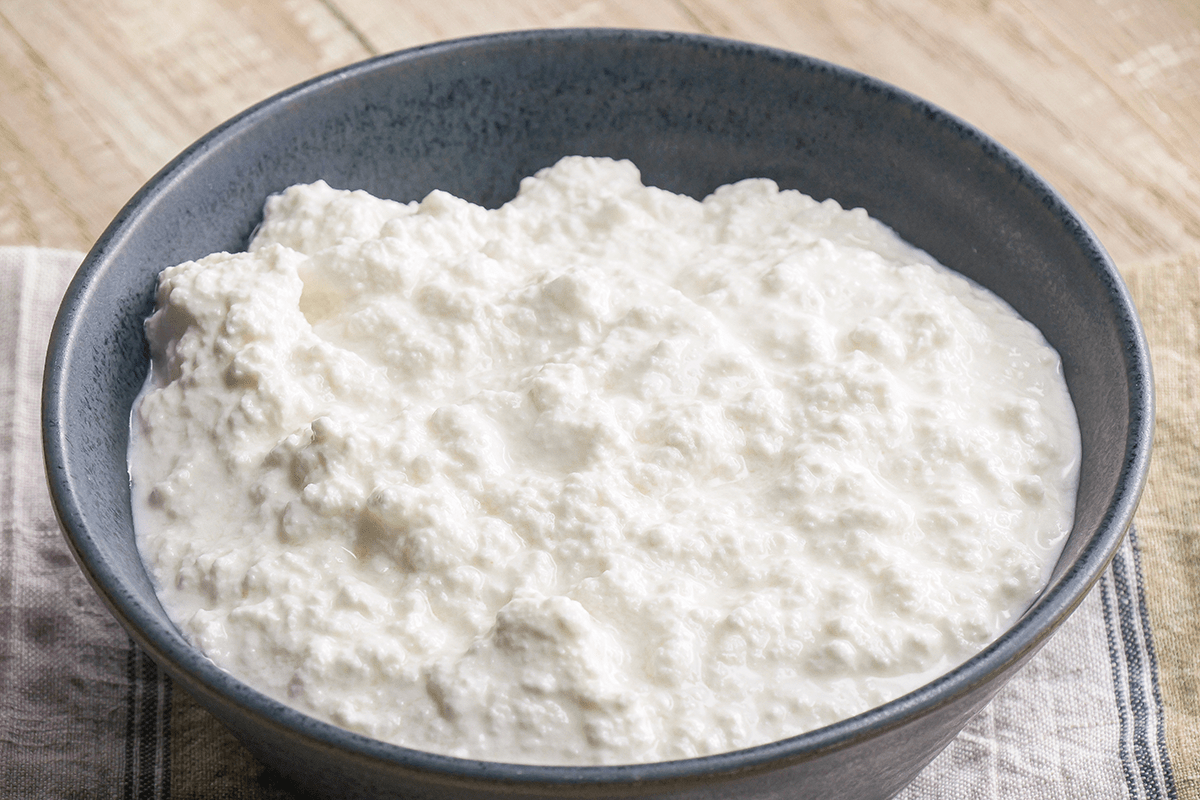 Homemade Ricotta Cheese is ready and served in a Bowl