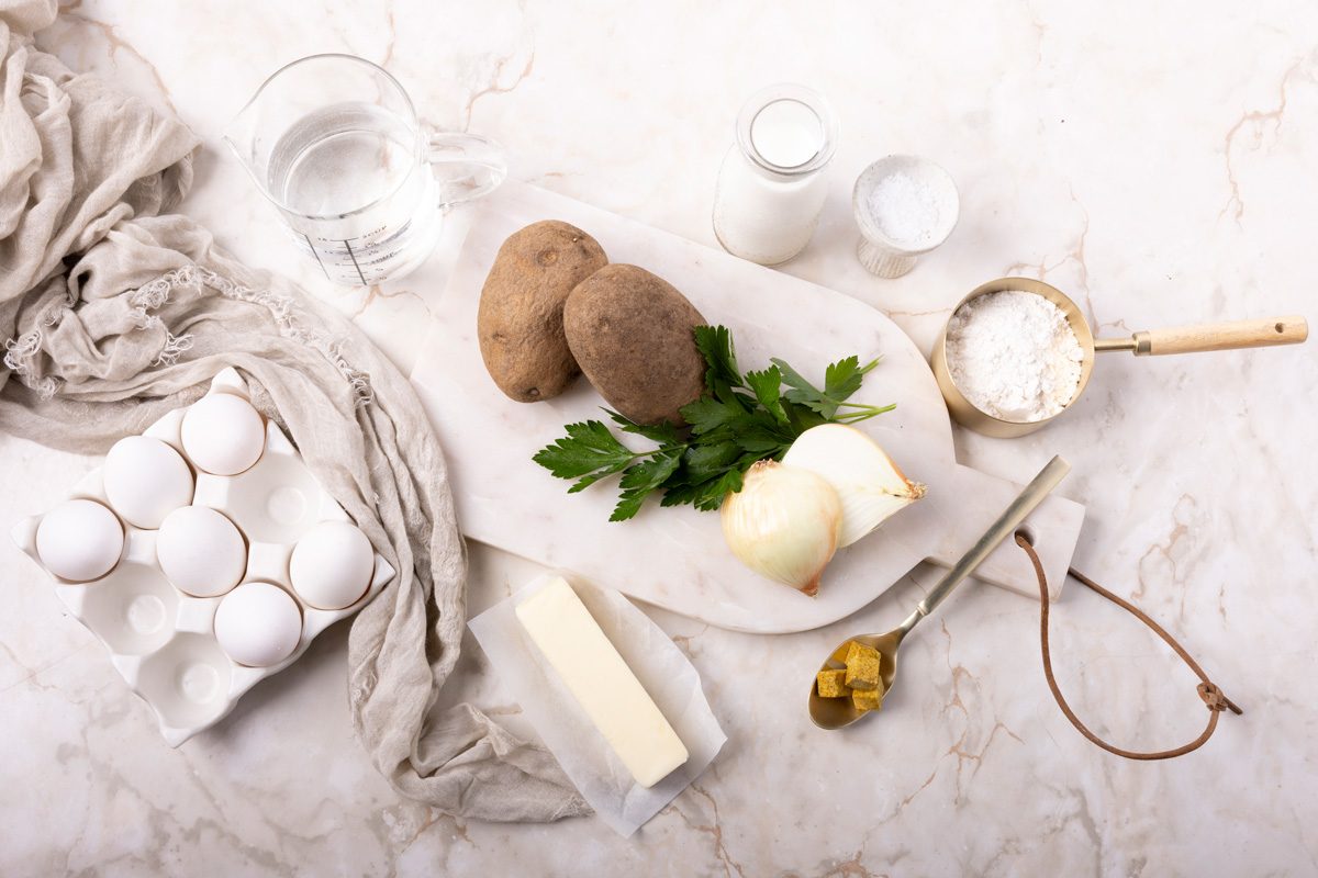 potatoes, butter, eggs, flour, milk, parsley, onions and bouillion cubes