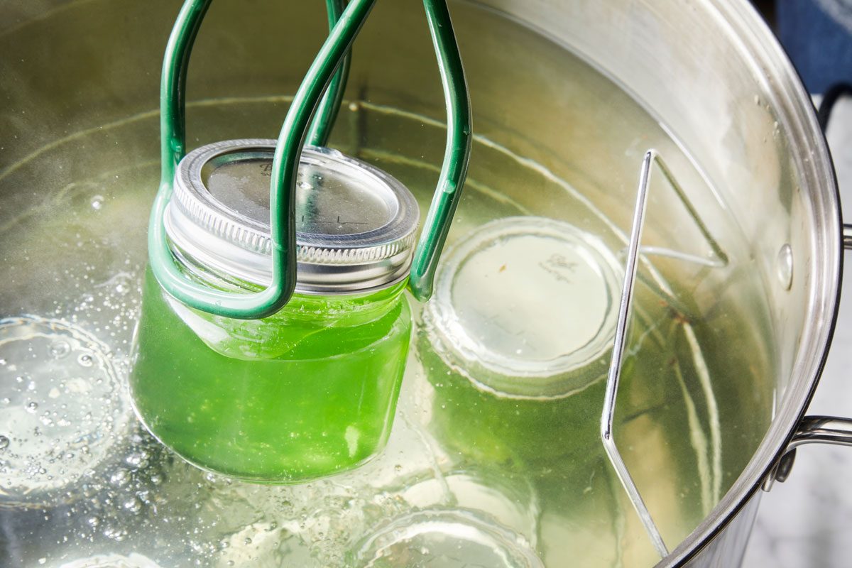 Close shot of removing jars; wait for completely cool; marble surface;