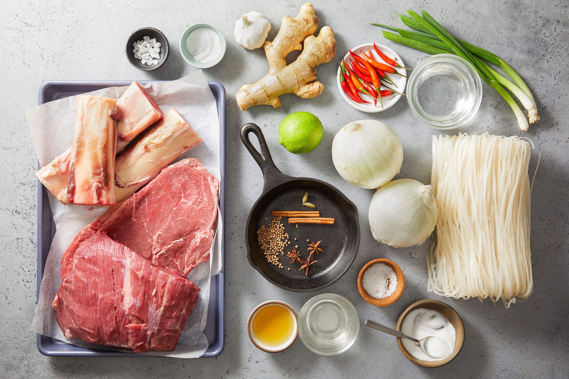 Pho (vietnamese Noodle Soup) recipe ingredients on a counter top