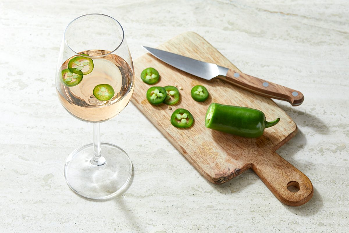 Glass of Wine with Jalapenos