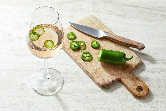 Glass of Wine with Jalapenos