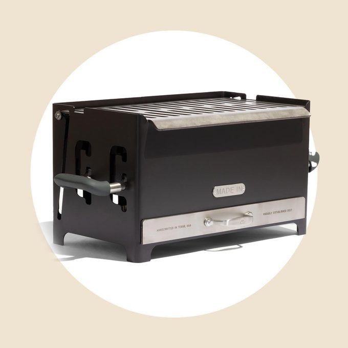 MadeIn portable grill on a tan and white background