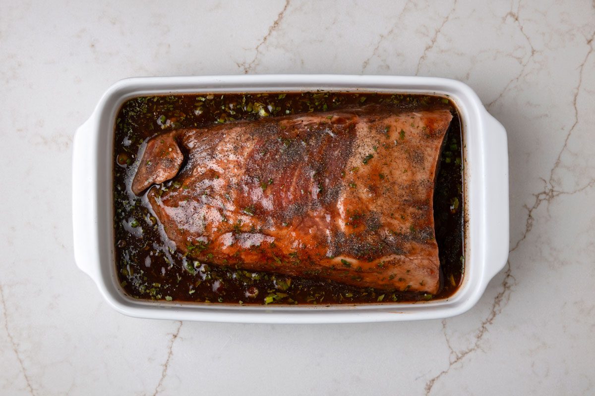 In a bowl combine 1 cup barbecue sauce; vinegar; 1/4 cup green onions and 1/4 cup cilantro; Sprinkle brisket with salt and pepper; add to bowl and turn to coat; Cover and refrigerate for 8 hours or overnight