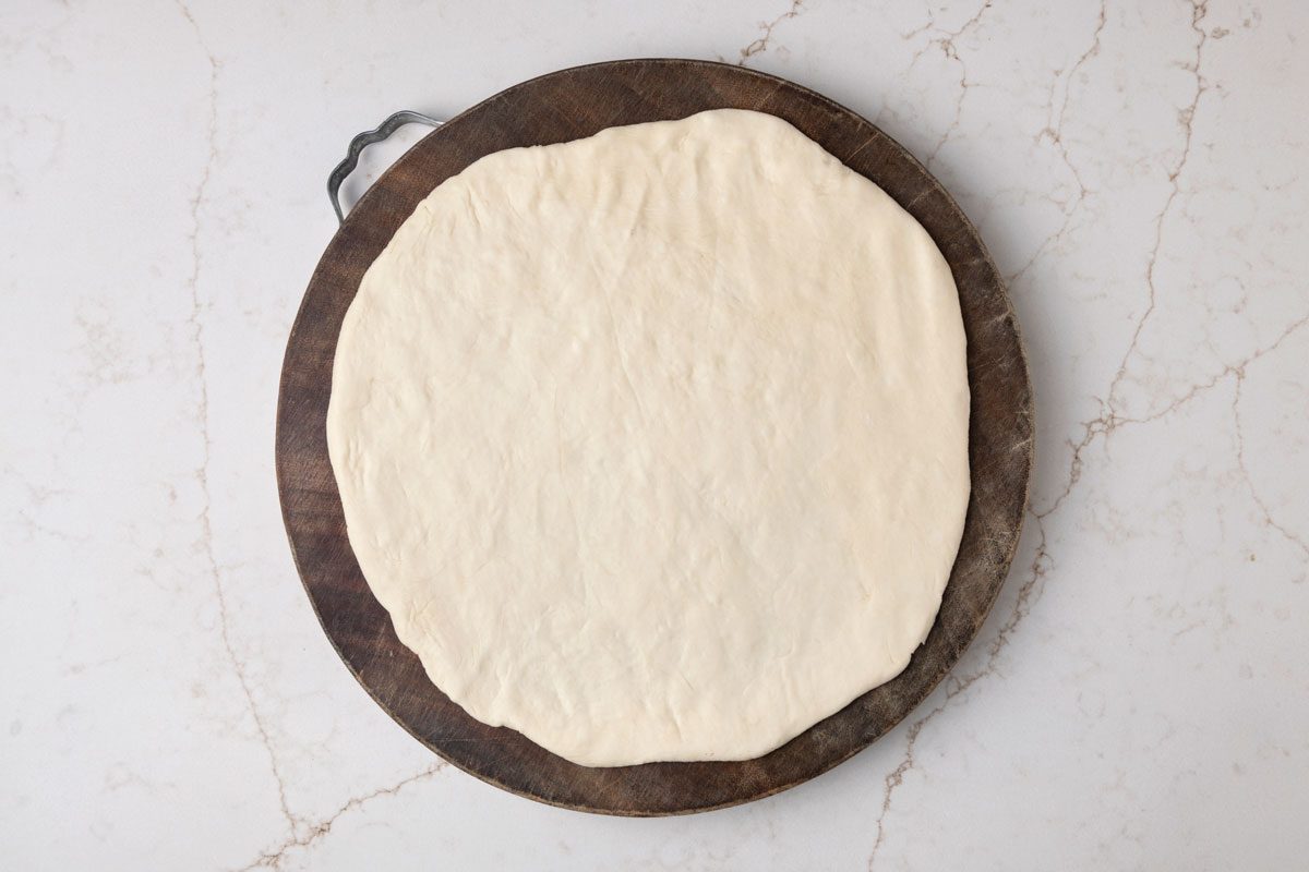 Punch dough down; Roll each into a 15 inch circle