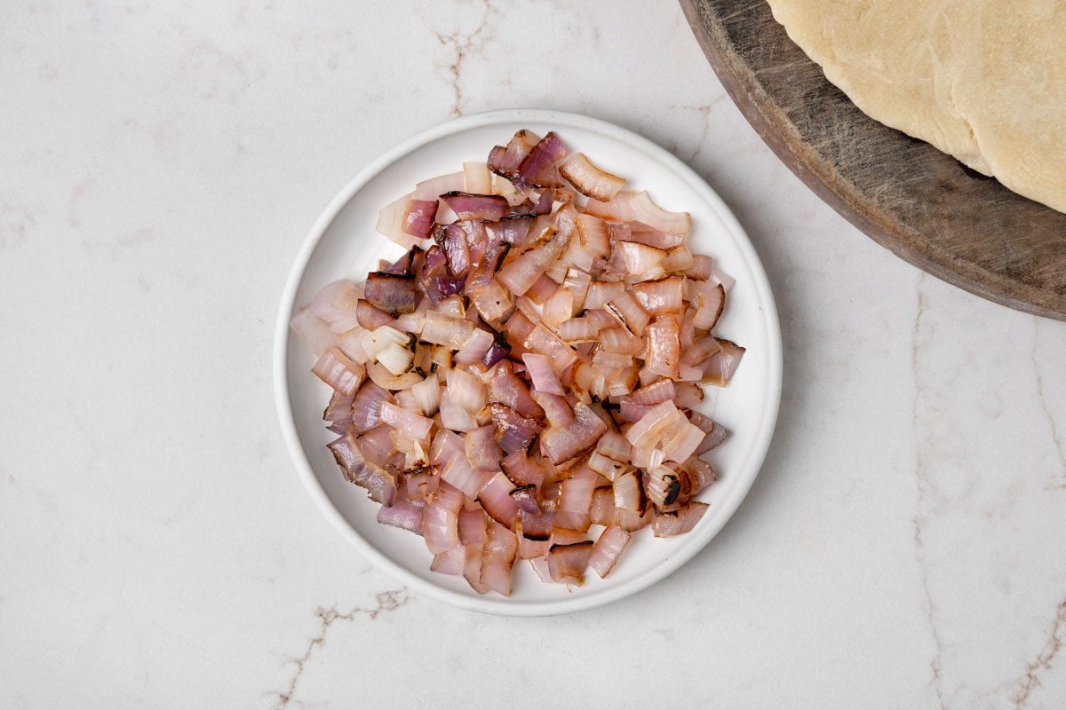 Brush onion with oil