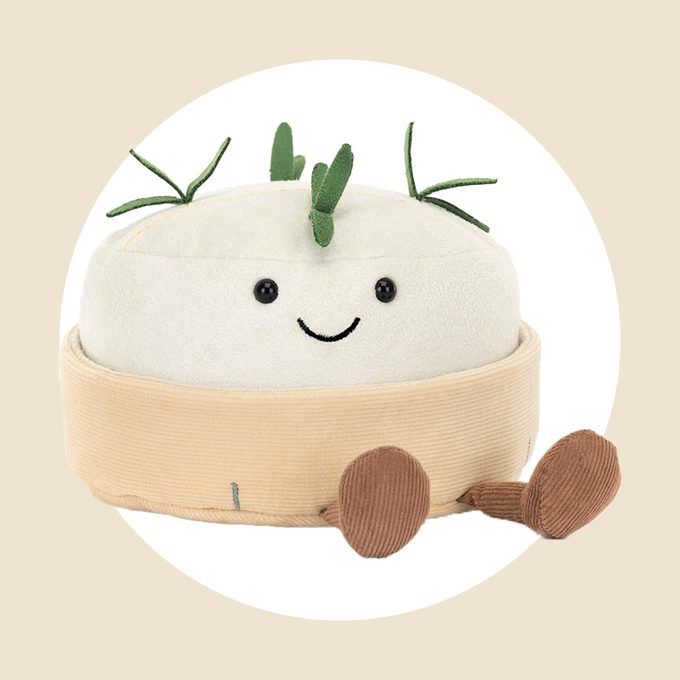 Camembert Jellycat toy placed in a white circle background